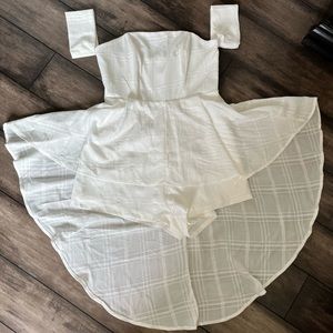 Off the shoulder white romper with train